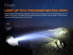 Fenix LR60R flashlight illuminating a cave with text about its 1130-meter beam distance.