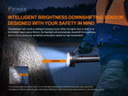 Person holding a flashlight with text about intelligent brightness downshifting sensor