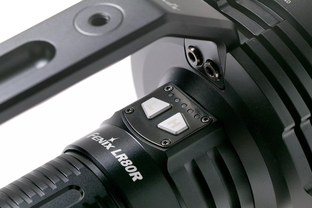 Close-up of a black flashlight with 'Ren' branding on a white background