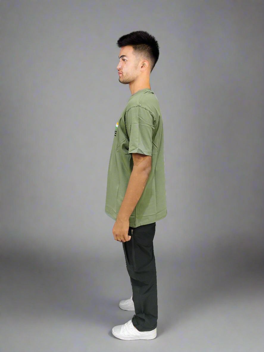 ADVENTURE HUT T-SHIRT OLIVE GREEN NO ONE FIGHTS ALONE ADVENTURES