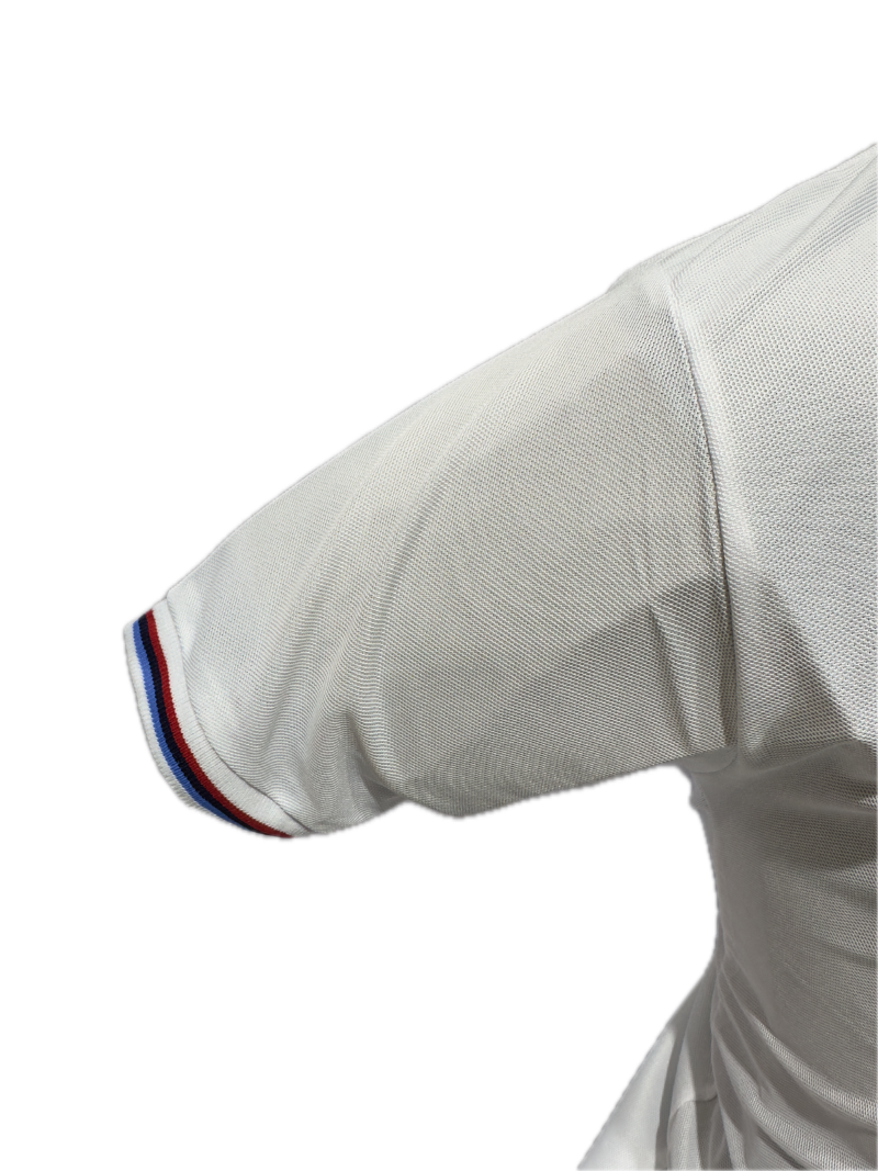Close-up of a white sports jersey with a collar detail on a white background