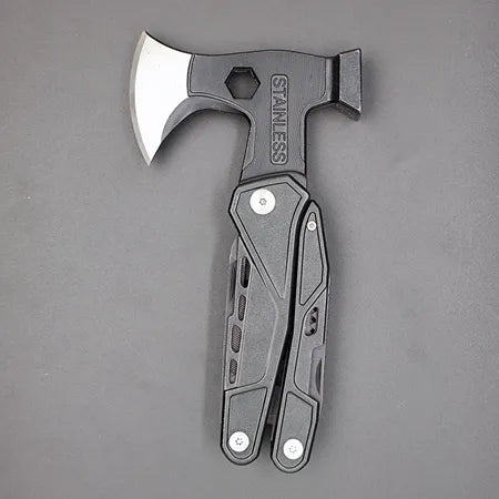 Multitool axe with a metallic head and black handle on a gray background