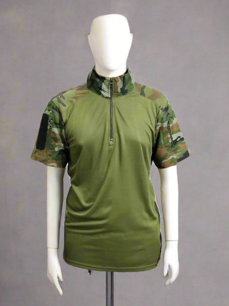Green athletic shirt on a mannequin against a gray background