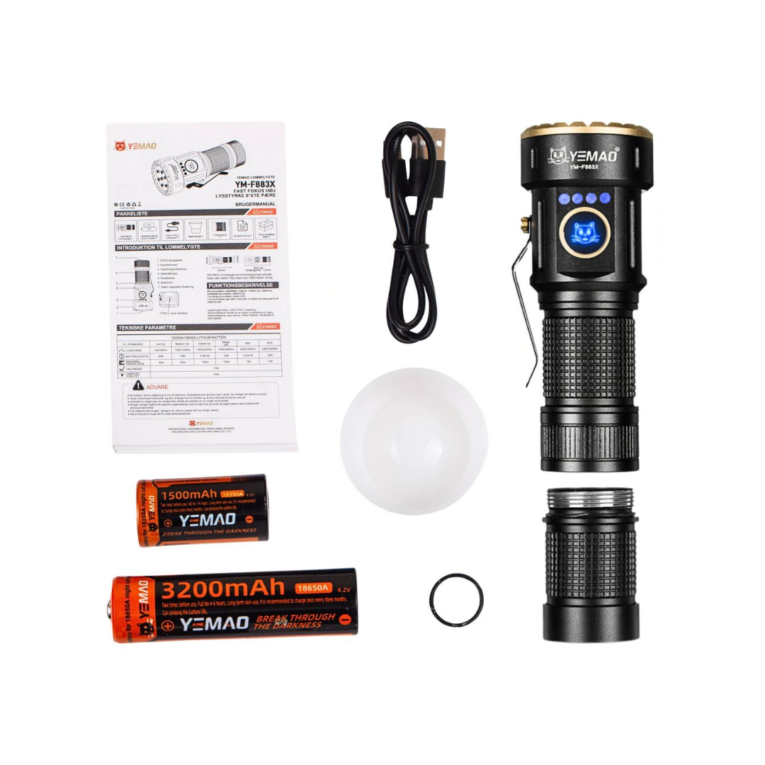 YEMAD flashlight set with batteries, charger, and accessories on a white background